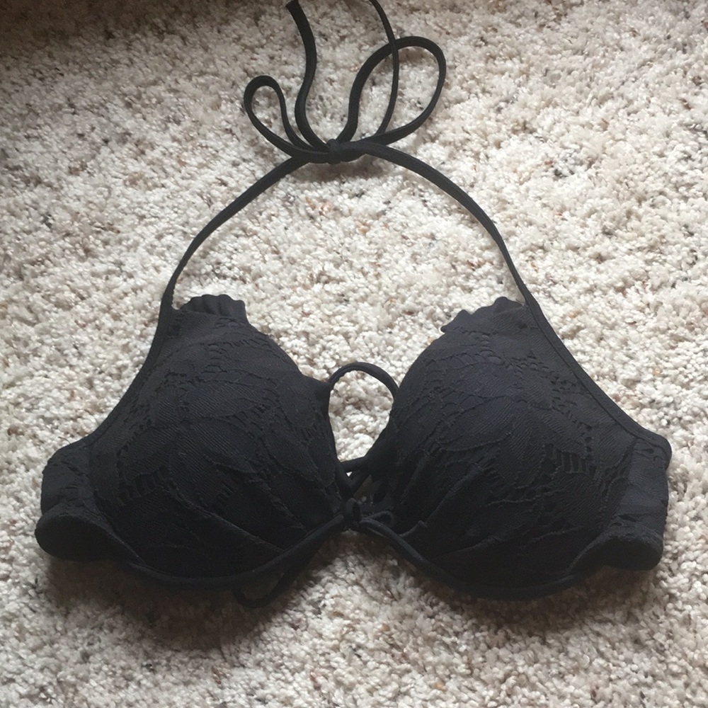 Vs halter lace top with conch string tie.